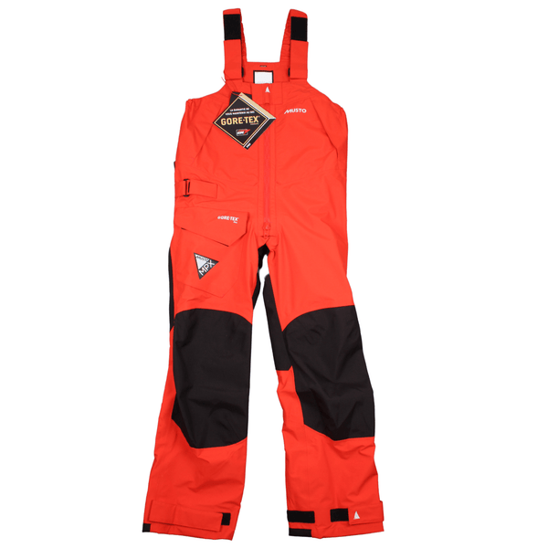 Front view of the Musto MPX Gore-Tex Pro Off Shore Trousers In Fire Orange. Featuring the Musto and Gore-Tex branding