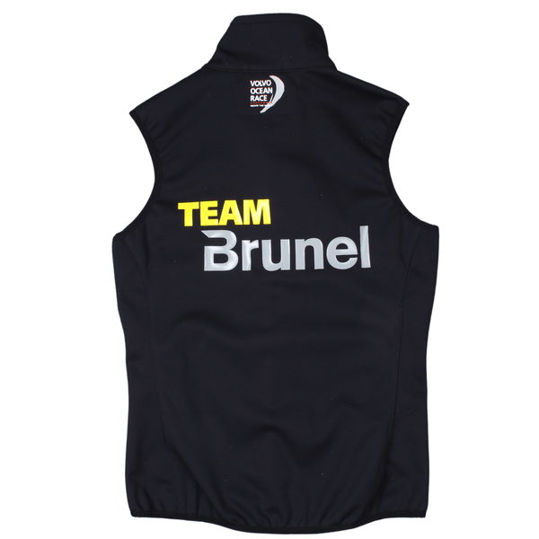 Rear view of the Musto Team Brunel soft shell gilet with a large Team Brunel logo on the back. The Volvo Ocean Race logo is also present at the back of the neck